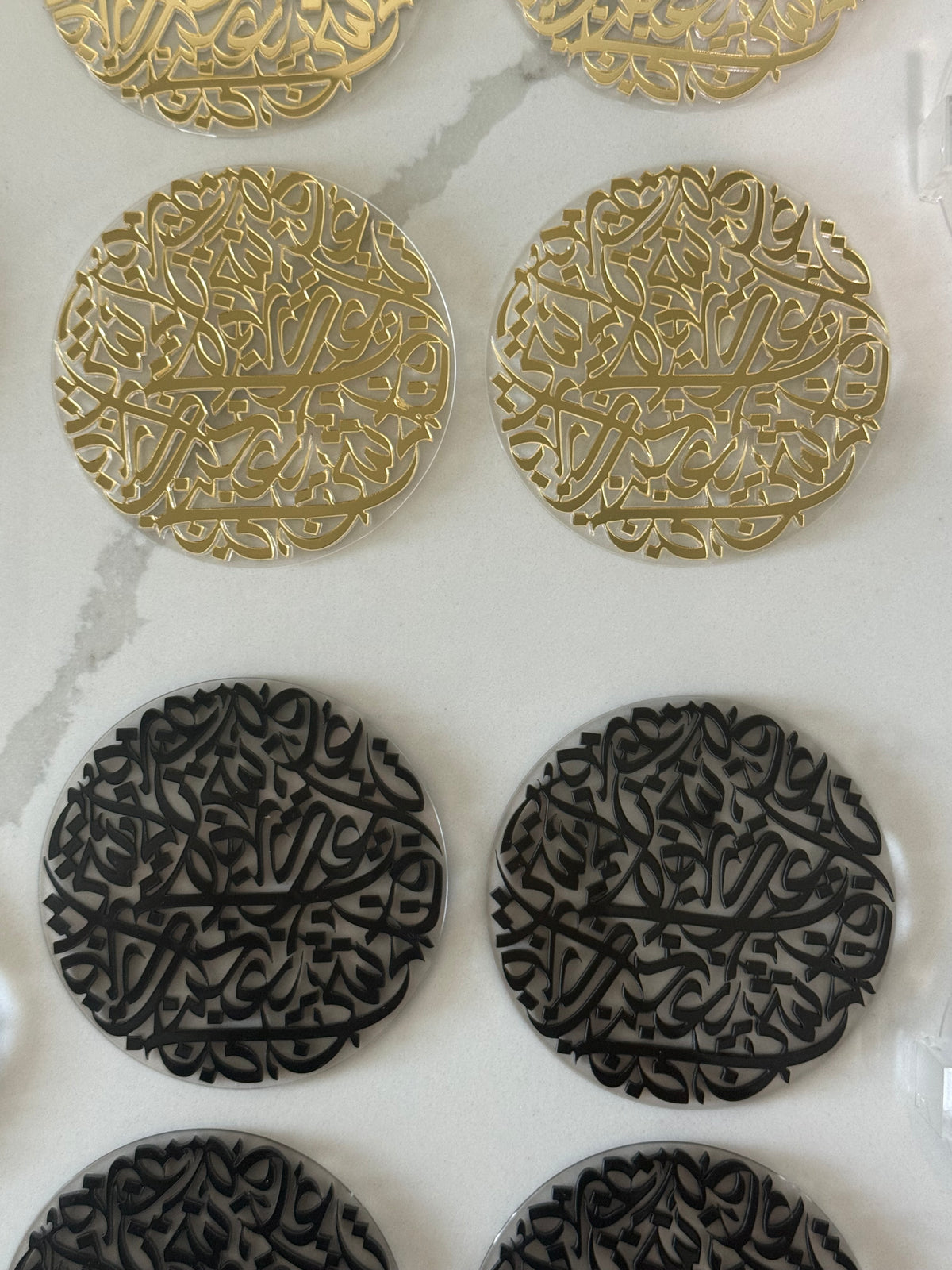 7 pcs Arabic Calligraphy Acrylic Coasters by Khatt By Randa | Black & Gold Set of 6 & Coaster Holder