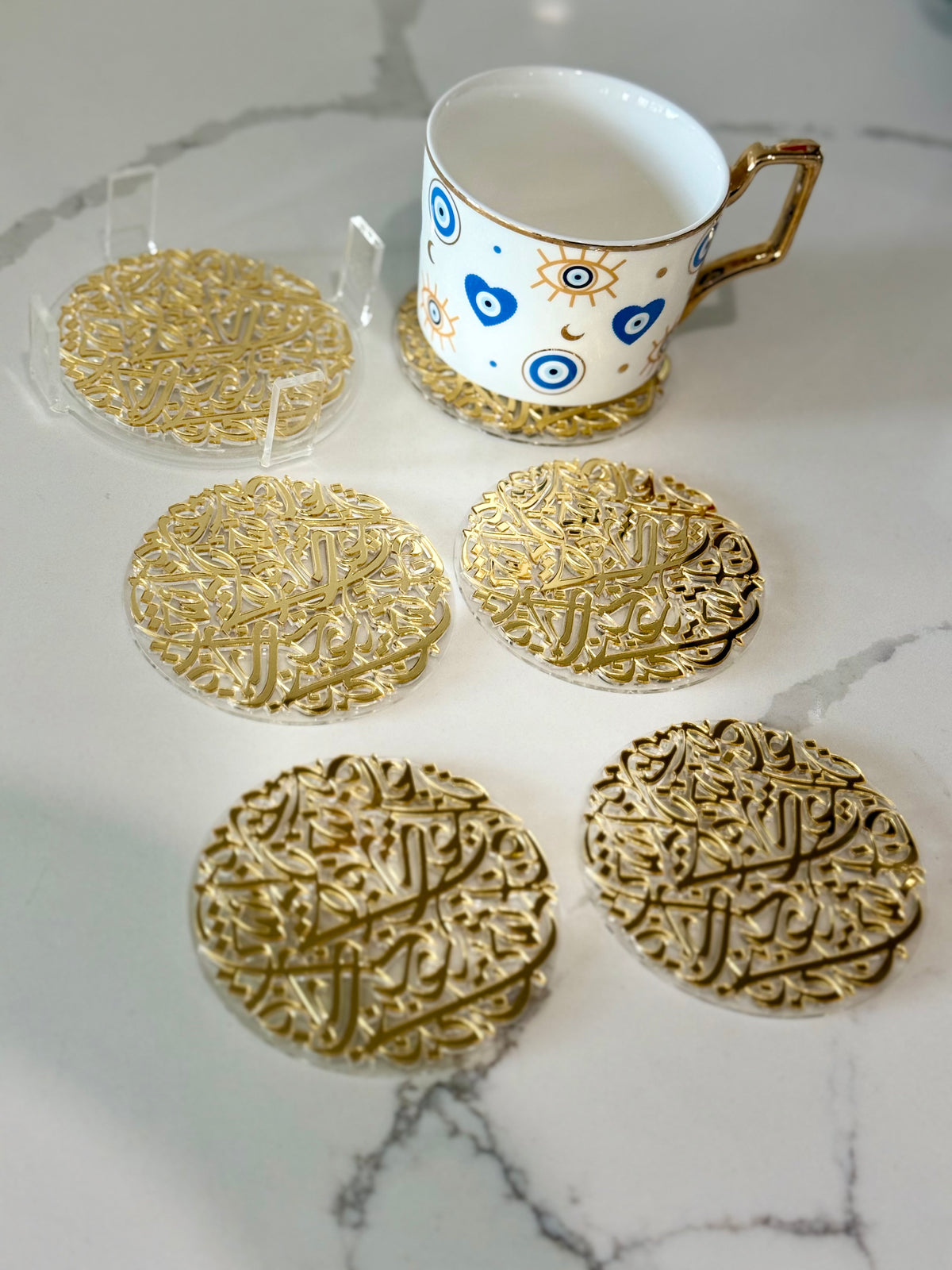 7 pcs Arabic Calligraphy Acrylic Coasters by Khatt By Randa | Black & Gold Set of 6 & Coaster Holder